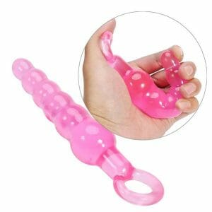 7 Inch Long Silicone Anal Beads with a ring or similar handle designed for pulling